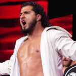 RUSH’s AEW Absence Tied to Visa Issues, Return Expected